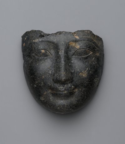 Face from a sarcophagus cover, purchased in Luxor, New Kingdom by Egyptian 18th Dynasty