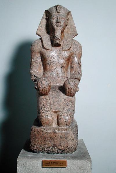 Kneeling Statue of Amenhotep II Holding Offerings of Wine by Egyptian 18th Dynasty