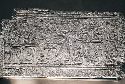 Relief of Ptahotep and Tauseret from Saqqara, the couple receiving offers from their eldest son Amenheb and other children by Egyptian 19th Dynasty
