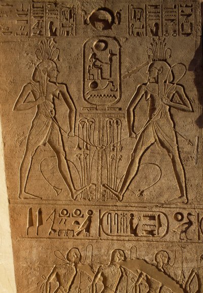 Union between Upper and Lower Egypt and cartouche of Pharaoh, relief on base of thrones, Temple of Ramesses II, Abu Simbel, Egypt, New Kingdom, Dynasty XIX by Egyptian 19th Dynasty
