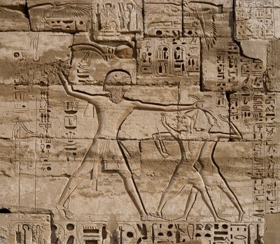 Egyptian antiquity: detail of reliefs celebrating the victories of the Pharaoh over the peoples of the sea. Funeral Temple of Ramses III (1187-1156 BC). Luxor, Medinet Habu, Egypt by Egyptian 20th Dynasty