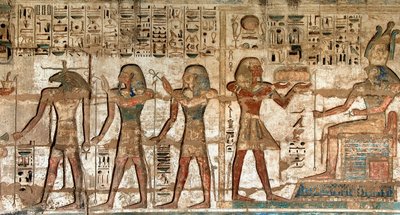 First court, detail of painted reliefs depicting the pharaoh carrying offerings to the deities Horus and Khnoum. Funeral Temple of Ramses III, Luxor, Medinet Habou, Egypt by Egyptian 20th Dynasty