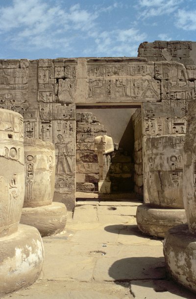 Statue of Ramesses in a chapel leading from the Hypostyle Hall of the Mortuary Temple of Ramesses III by Egyptian 20th Dynasty