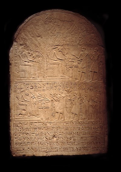 Limestone Stele Representing Pia Worshipping the Crocodile God Sobek Followed by Her Son Iy-Hebnef Making Offerings to the God by Egyptian Egyptian