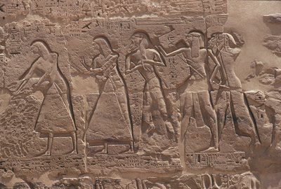 Relief of Scribe and Captive in Fortified Temple of Ramses III at Medinet Habu by Egyptian Egyptian