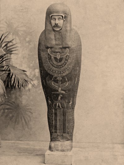 Archduke Franz Ferdinand of Austria posing as a mummy while in Cairo by Egyptian Photographer