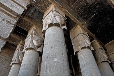 Partial View of the Hypostyle Room with Columns Decorated with the Representation of the Goddess Hathor, Temple of Hathor, Denderah, Egypt by Egyptian Ptolemaic Period