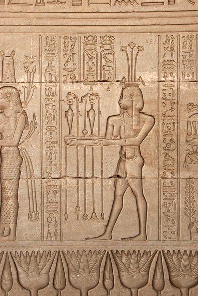 Egyptian antiquity: representation of a man bringing offerings as homage to the goddess, Temple of Hathor, Denderah, Egypt by Egyptian Ptolemaic Period