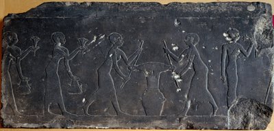 Limestone plate decorated with low relief representing the pressing of lotus flowers, 8th to 7th century BC (relief) by Egyptian School