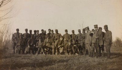 Album of the First World War in Friuli-Venezia Giulia: group portrait of the soldiers of the Infantry 112.mo with two machine guns near the River Tower by Elena Bianconcini