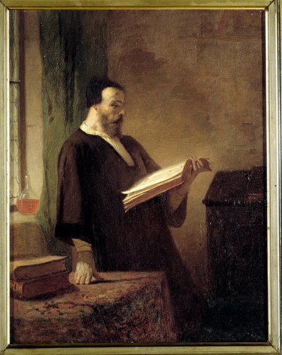 A bibliophile A man reading a book by Emile Vaude