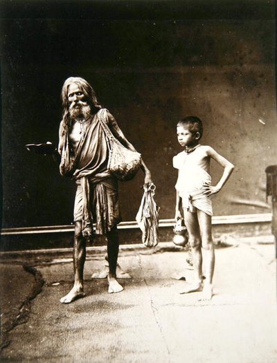 A Fakir and his assistant, India, c.1880 by English Photographer