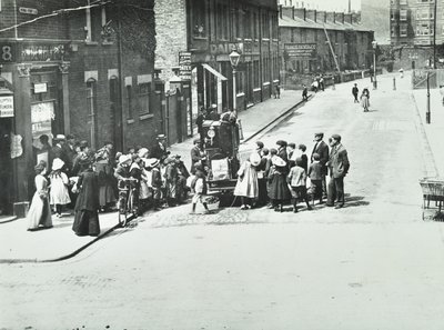 A Street Organist in Putney, London, 1886 by English Photographer