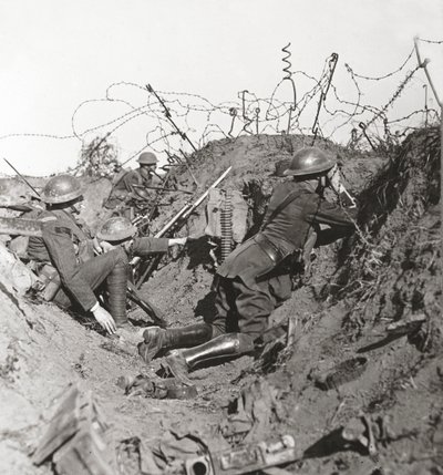 Awaiting the great Hun attack, observation officer and signallers at St Quentin keep a sharp look out by English Photographer
