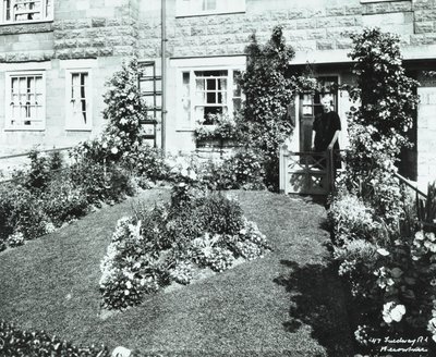 Becontree Estate: view of an attractive front garden by English Photographer