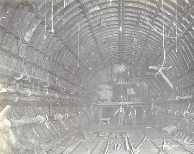 Blackwall Tunnel: Two Men Stand in the Air Lock, 1894 by English Photographer