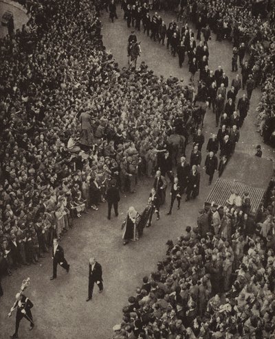 British Prime Minister Winston Churchill and his cabinet walking to the Church of St Margaret, Westminster, for a service of thanks for deliverance from the threat of invasion by Nazi Germany, 8 May 1945 by English Photographer