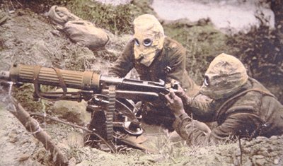 British Vickers Machine Gun Crew on the Somme, Wearing Helmets as Protection Against German Phosgene Gas by English Photographer
