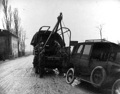 British soldiers towing a motor vehicle in Italy during WWI by English Photographer