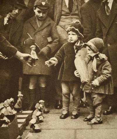 Children crowding round a street hawker, Holborn by English Photographer
