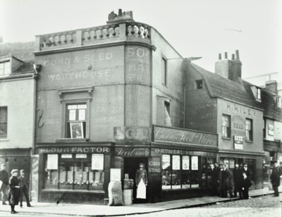Deptford Broadway: street scene with shop fronts, London, 1897 by English Photographer