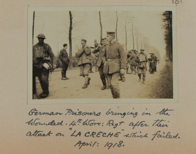 German Prisoners bringing in the wounded, 4th, Worc: Rgt. after their attack on 