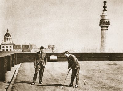 Golf practice for office workers on the roof of Adelaide House, from Wonderful London, published 1926-27 by English Photographer