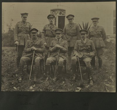 Group portrait of seven men in military uniform, 1914-18 by English Photographer