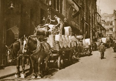 Hoisting the paper into the Newspaper office by English Photographer