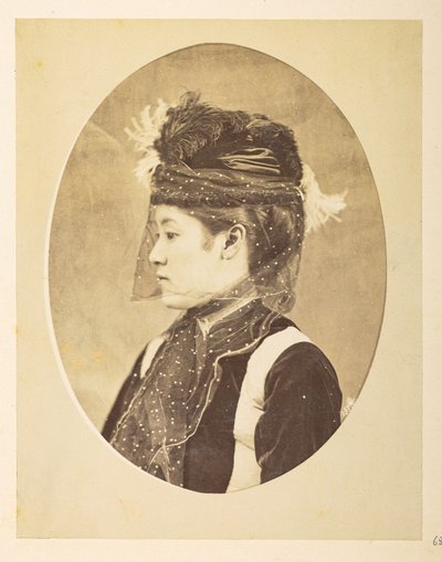 Japanese woman in European dress, Oval image; head-and-shoulders left profile portrait by English Photographer