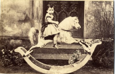 Little Girl on a Large Rocking Horse in a Garden, 1860s by English Photographer