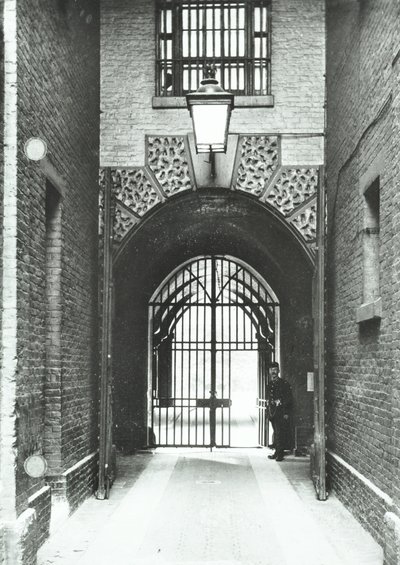 Millbank Prison: main passageway, Warden Barnard in doorway by English Photographer