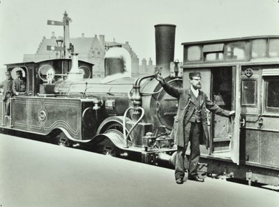 Platform Porter at a Railway Station, 1885 by English Photographer