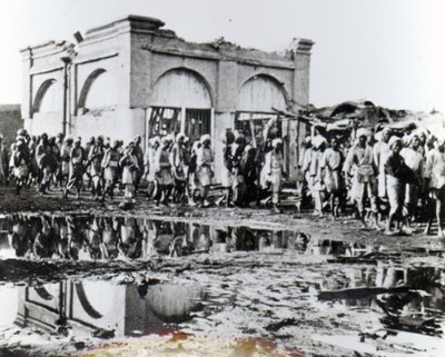 Prisoners passing the Mihrab, the Khalifa