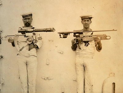 Two Sailors, from the HMS Glory, holding guns by English Photographer