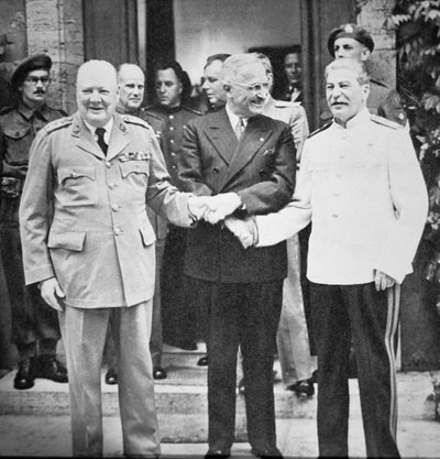 Winston Churchill, President Truman, and Joseph Stalin shaking hands at the Potsdam Conference, July 1945 by English Photographer