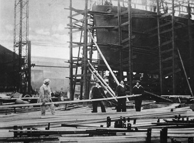 Women at work in a Naval ship-building yard by English Photographer