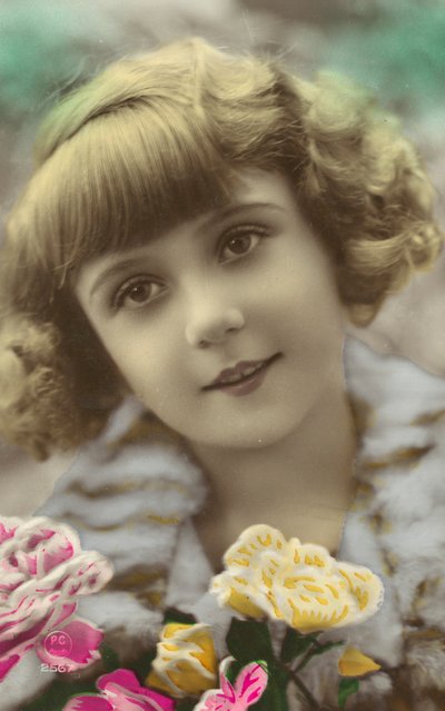 Young Girl Posing with Flowers by English Photographer
