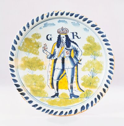 A Bristol Delft polychrome royal portrait charger painted with a full length portrait of George I in formal robes, c.1720 by English School