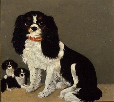 A Cavalier King Charles Spaniel with Puppies by English School