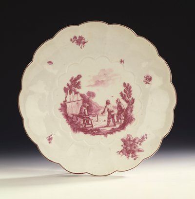 A Chelsea large fluted circular dish painted with three peasants playing marbles after Tenier