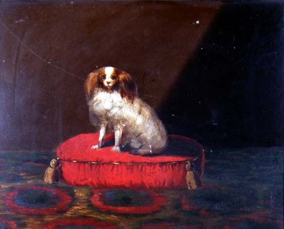 A King Charles Spaniel on a Red Cushion by English School