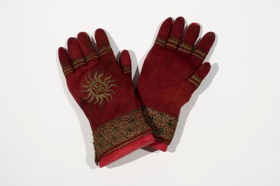 A pair of knitted silk gloves, possibly once belonging to Archbishop William Warham, late 15th or early 16th century by English School