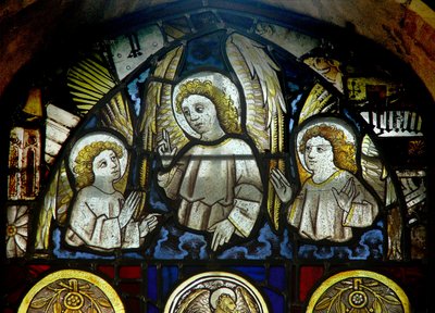 A panel in the east window depicting angels by English School