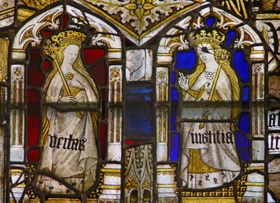 A panel in the east window depicting the Cardinal Virtues: Truth (Veritas) and Justice (Iustitia) by English School