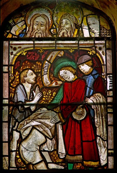 A panel in the east window depicting the Works of Mercy: clothing the naked: also some fine reset heads by English School