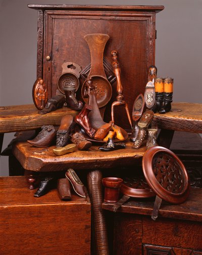 A selection of 19th century wooden strainers, shoe snuffs and other objects by English School