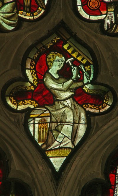 A window in the Lady Chapel depicting a musician angel with bells by English School