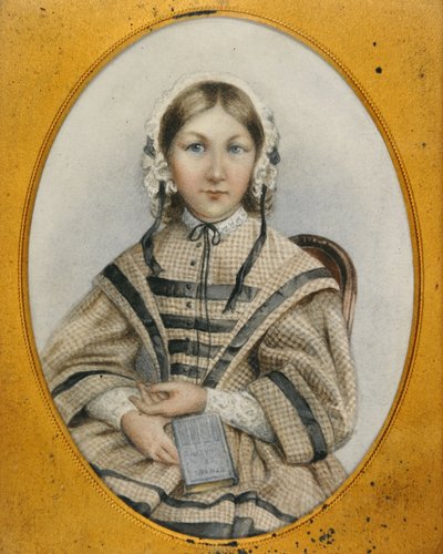 A young Florence Nightingale in an oval frame by English School