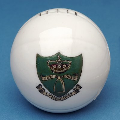 Armorial souvenir miniature football with transfer of the Lyndhurst, New Forest crest (ceramic) by English School